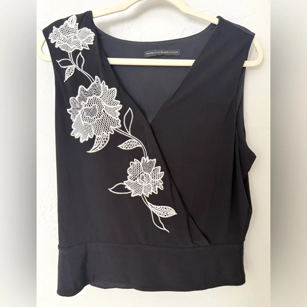 Black Sleeveless Top with White Floral Embroidery - Picture 1 of 6